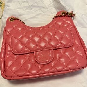 Hot pink quilted bag with gold chain